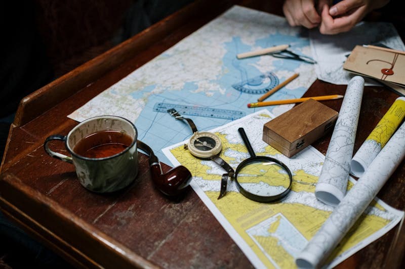 Maps and compass for planning a route